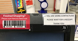 Sticker on Tesco self-checkout till.